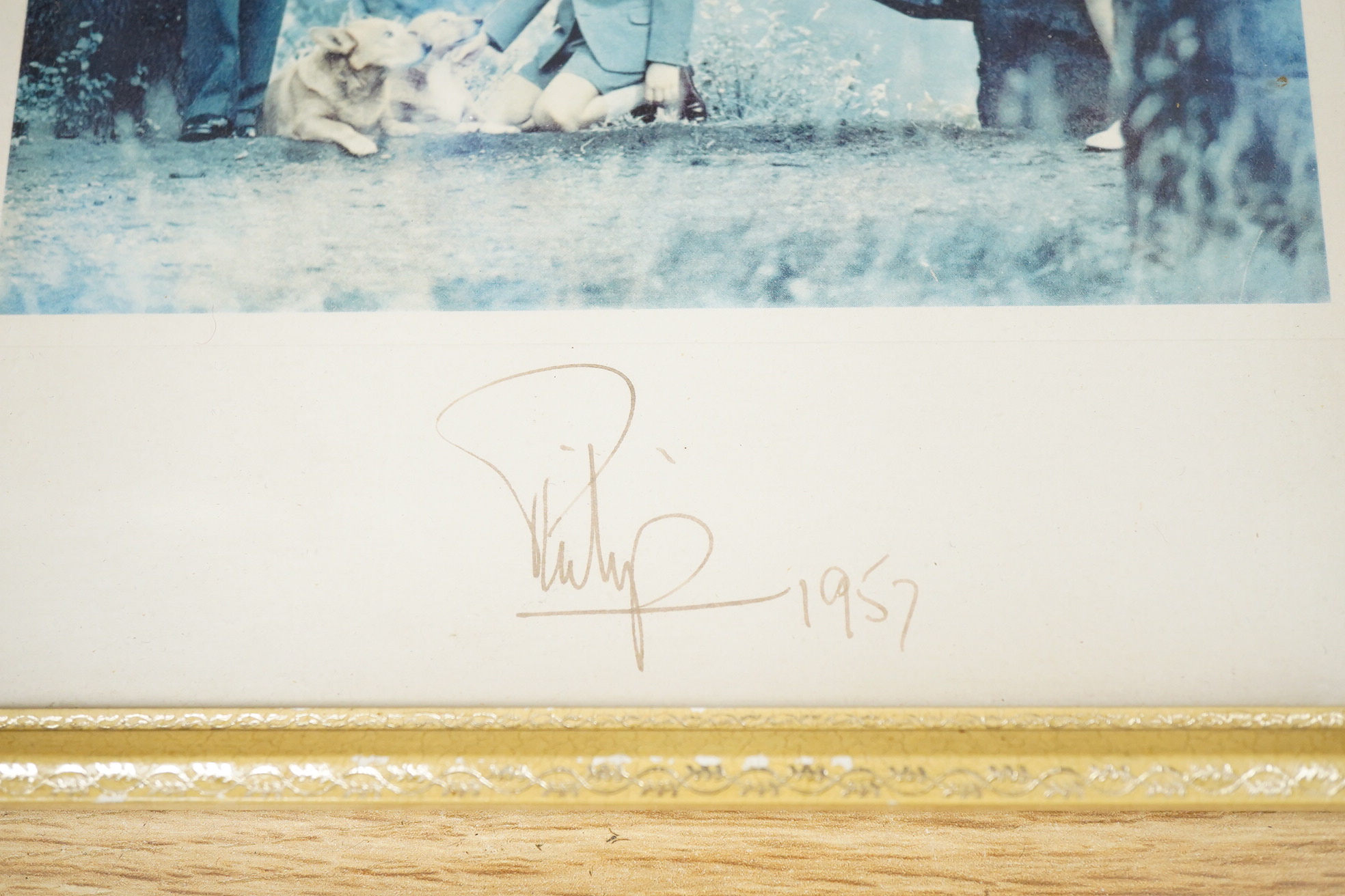 Two autographed photographs of Prince Philip dated 1957, framed
